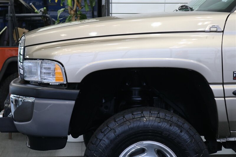 2002 Dodge Ram 2500 SLT  1-OWNER* 100% RUST FREE* 100% STOCK* NEW 3 " LEVEL KIT W/ BILSTEIN 5100* NEW 34 " TOYO A/T III 10-PLYs* NEW BRAKES-ROTORS-CALIPERS-BRAKE FLUID FLUSH-COOLANT FLUSH-AC SERVICE* HIGH OUTPUT* 6-SPEED - Photo 56 - Portland, OR 97230