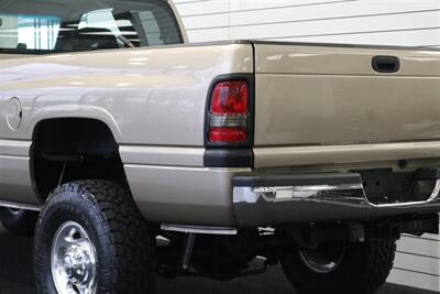 2002 Dodge Ram 2500 SLT  1-OWNER* 100% RUST FREE* 100% STOCK* NEW 3 " LEVEL KIT W/ BILSTEIN 5100* NEW 34 " TOYO A/T III 10-PLYs* NEW BRAKES-ROTORS-CALIPERS-BRAKE FLUID FLUSH-COOLANT FLUSH-AC SERVICE* HIGH OUTPUT* 6-SPEED - Photo 49 - Portland, OR 97230