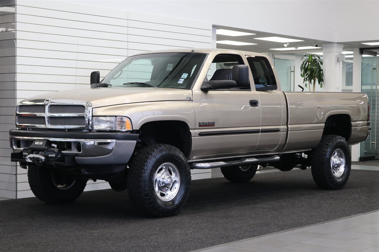 2002 Dodge Ram 2500 SLT  1-OWNER* 100% RUST FREE* 100% STOCK* NEW 3 " LEVEL KIT W/ BILSTEIN 5100* NEW 34 " TOYO A/T III 10-PLYs* NEW BRAKES-ROTORS-CALIPERS-BRAKE FLUID FLUSH-COOLANT FLUSH-AC SERVICE* HIGH OUTPUT* 6-SPEED - Photo 1 - Portland, OR 97230