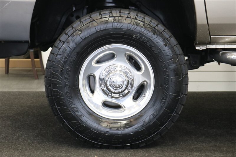 2002 Dodge Ram 2500 SLT  1-OWNER* 100% RUST FREE* 100% STOCK* NEW 3 " LEVEL KIT W/ BILSTEIN 5100* NEW 34 " TOYO A/T III 10-PLYs* NEW BRAKES-ROTORS-CALIPERS-BRAKE FLUID FLUSH-COOLANT FLUSH-AC SERVICE* HIGH OUTPUT* 6-SPEED - Photo 21 - Portland, OR 97230