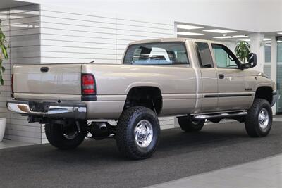 2002 Dodge Ram 2500 SLT  1-OWNER* 100% RUST FREE* 100% STOCK* NEW 3 " LEVEL KIT W/ BILSTEIN 5100* NEW 34 " TOYO A/T III 10-PLYs* NEW BRAKES-ROTORS-CALIPERS-BRAKE FLUID FLUSH-COOLANT FLUSH-AC SERVICE* HIGH OUTPUT* 6-SPEED - Photo 7 - Portland, OR 97230