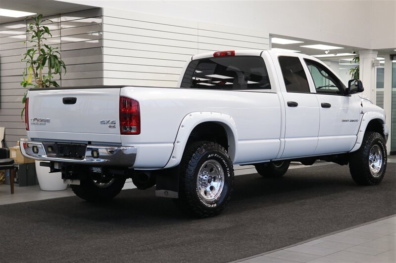 2004 Dodge Ram 3500 SLT 2-OWNER* 100% RUST & CORROSION FREE* 5.9L HIGH OUTPUT* NEW 35 " BFG KO3 10-PLYs* 2 " BILSTEIN LEVEL KIT* NEW 17 " WHEELS* TORKLIFT 20K HITCH W/ ACCESSORIES* REAR AIR BAGS* NEW BRAKES-ROTORS-CALIPERS - Photo 7 - Portland, OR 97230