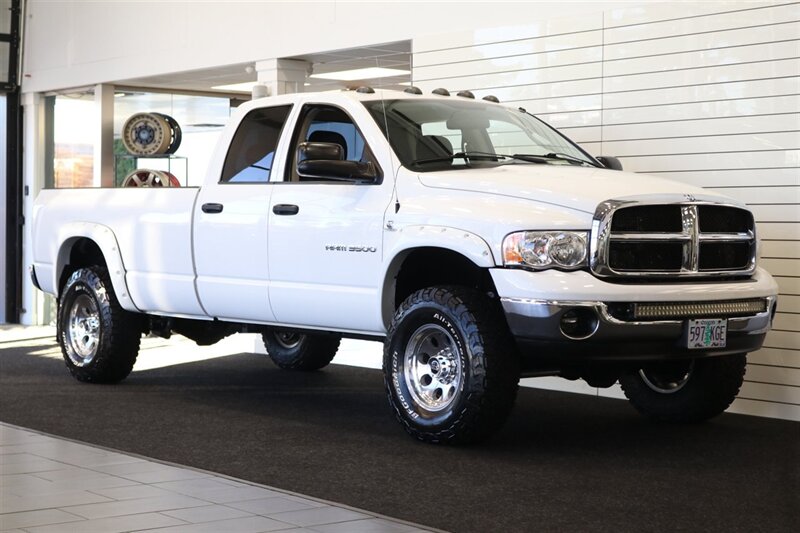 2004 Dodge Ram 3500 SLT 2-OWNER* 100% RUST & CORROSION FREE* 5.9L HIGH OUTPUT* NEW 35 " BFG KO3 10-PLYs* 2 " BILSTEIN LEVEL KIT* NEW 17 " WHEELS* TORKLIFT 20K HITCH W/ ACCESSORIES* REAR AIR BAGS* NEW BRAKES-ROTORS-CALIPERS - Photo 2 - Portland, OR 97230