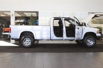 2004 Dodge Ram 3500 SLT 2-OWNER* 100% RUST & CORROSION FREE* 5.9L HIGH OUTPUT* NEW 35 " BFG KO3 10-PLYs* 2 " BILSTEIN LEVEL KIT* NEW 17 " WHEELS* TORKLIFT 20K HITCH W/ ACCESSORIES* REAR AIR BAGS* NEW BRAKES-ROTORS-CALIPERS - Photo 11 - Portland, OR 97230