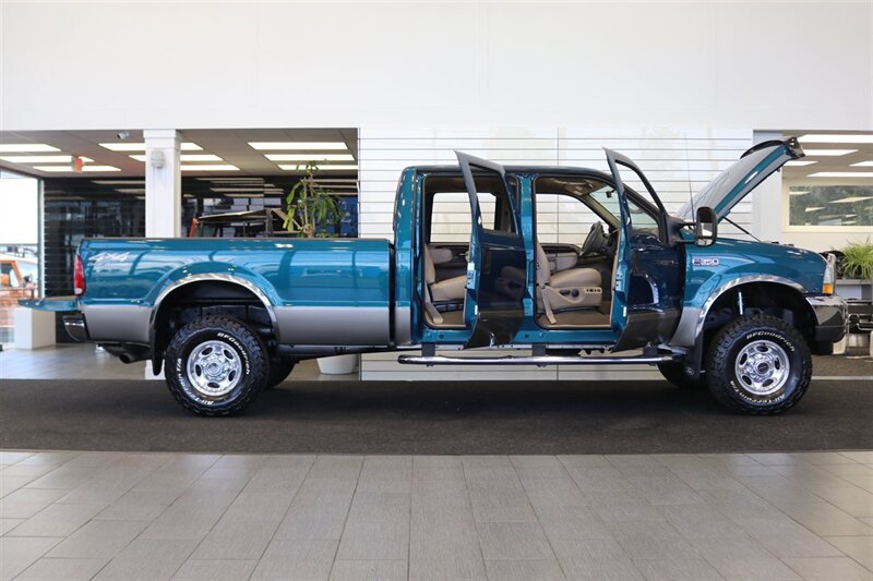 2002 Ford F-350 Super Duty Lariat 4dr Crew Cab Lariat 1-OWNER* NEVER HAD 5TH WHEEL-GOOSENECK* 0-RUST* ALL BOOKS-SERVICE RECORDS SINCE NEW-KEYS-WINDOW STICKER* NEW 2.5 "LEVEL LIFT W/ NEW 33 "BFG KO3s & BILSTEIN 5100s/ NEW BRAKES - ROTORS - Photo 11 - Portland, OR 97230