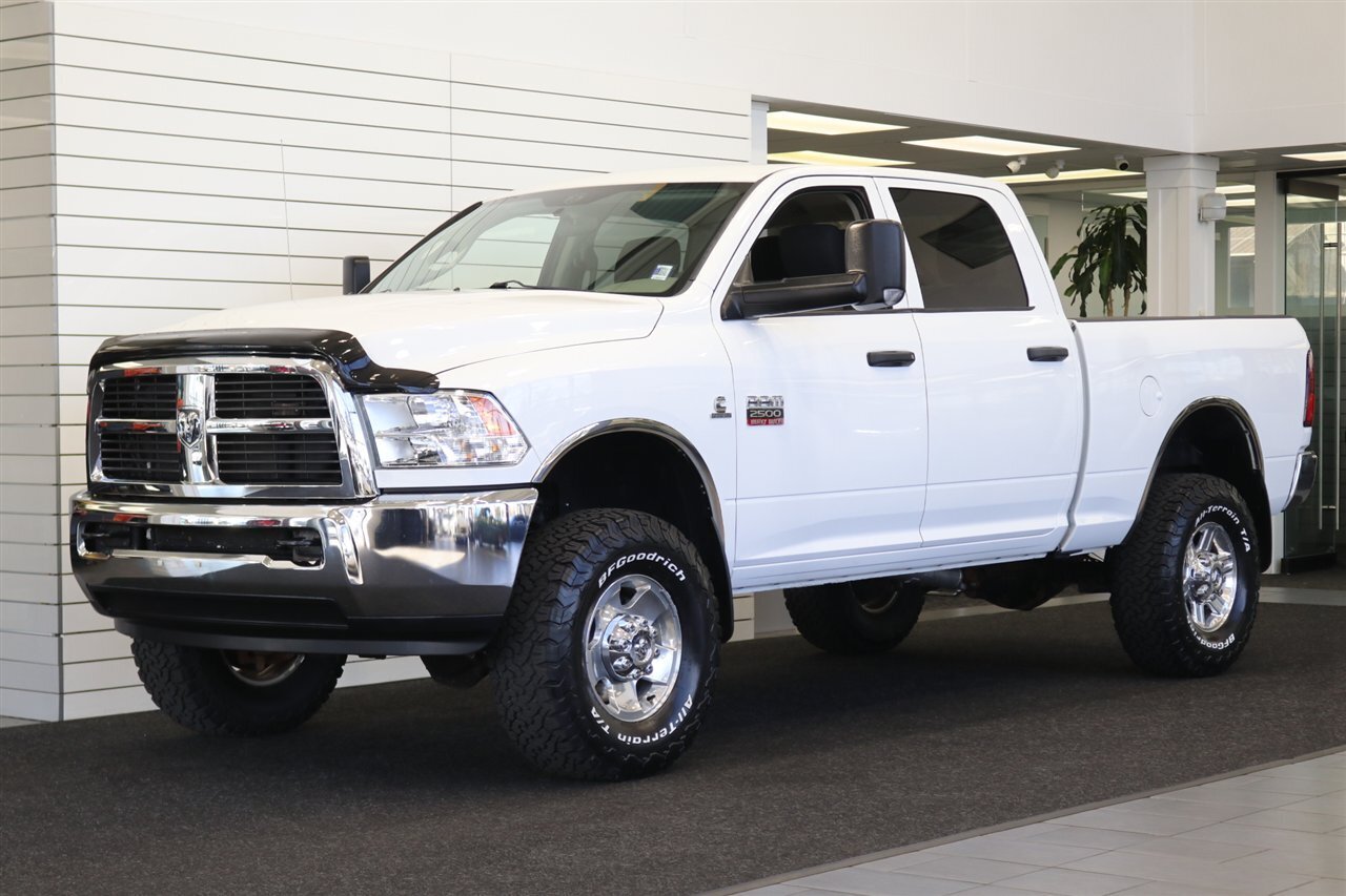2012 RAM 2500 ST  1-OWNER* 23K MILES ORIGINAL* 6-SPEED MANUAL* 100% STOCK* 0-RUST* CREW CAB SHORT BED* GOOSENECK* NEW BILSTEIN 5100 SHOCKS WITH 3 "LEVEL KIT* NEW 35 " BFG KO3 10-PLYS* ALL BOOKS & 4-KEYS - Photo 1 - Portland, OR 97230