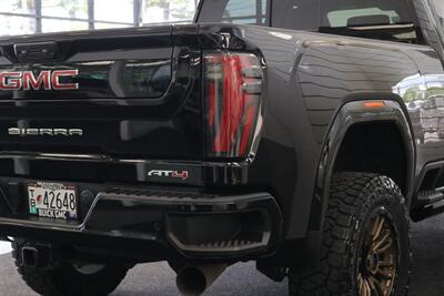 2024 GMC Sierra 3500 AT4  1-OWNER* 4 " COGNITO LIFT W/ FOX SHOCKS* 20 " FUELS 35 " TOYO R/Ts* AT4 PREM PLUS PKG*  PAINT MATCHED FLARES* FULL FRONT PPF* ALL BOOKS & 2-KEYS - Photo 14 - Portland, OR 97230