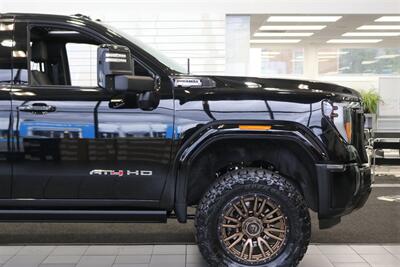 2024 GMC Sierra 3500 AT4  1-OWNER* 4 " COGNITO LIFT W/ FOX SHOCKS* 20 " FUELS 35 " TOYO R/Ts* AT4 PREM PLUS PKG*  PAINT MATCHED FLARES* FULL FRONT PPF* ALL BOOKS & 2-KEYS - Photo 57 - Portland, OR 97230