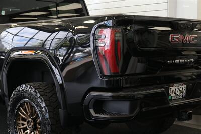 2024 GMC Sierra 3500 AT4  1-OWNER* 4 " COGNITO LIFT W/ FOX SHOCKS* 20 " FUELS 35 " TOYO R/Ts* AT4 PREM PLUS PKG*  PAINT MATCHED FLARES* FULL FRONT PPF* ALL BOOKS & 2-KEYS - Photo 15 - Portland, OR 97230