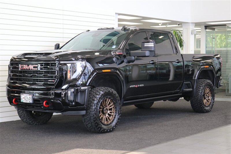 2024 GMC Sierra 3500 AT4  1-OWNER* 4 " COGNITO LIFT W/ FOX SHOCKS* 20 " FUELS 35 " TOYO R/Ts* AT4 PREM PLUS PKG*  PAINT MATCHED FLARES* FULL FRONT PPF* ALL BOOKS & 2-KEYS - Photo 3 - Portland, OR 97230