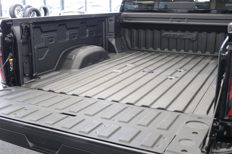 2024 GMC Sierra 3500 AT4  1-OWNER* 4 " COGNITO LIFT W/ FOX SHOCKS* 20 " FUELS 35 " TOYO R/Ts* AT4 PREM PLUS PKG*  PAINT MATCHED FLARES* FULL FRONT PPF* ALL BOOKS & 2-KEYS - Photo 31 - Portland, OR 97230