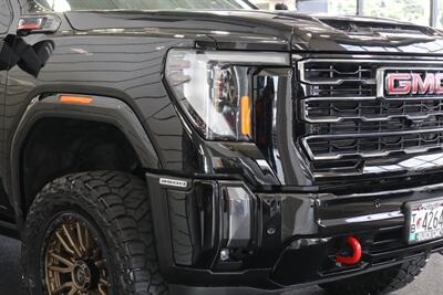 2024 GMC Sierra 3500 AT4  1-OWNER* 4 " COGNITO LIFT W/ FOX SHOCKS* 20 " FUELS 35 " TOYO R/Ts* AT4 PREM PLUS PKG*  PAINT MATCHED FLARES* FULL FRONT PPF* ALL BOOKS & 2-KEYS - Photo 13 - Portland, OR 97230
