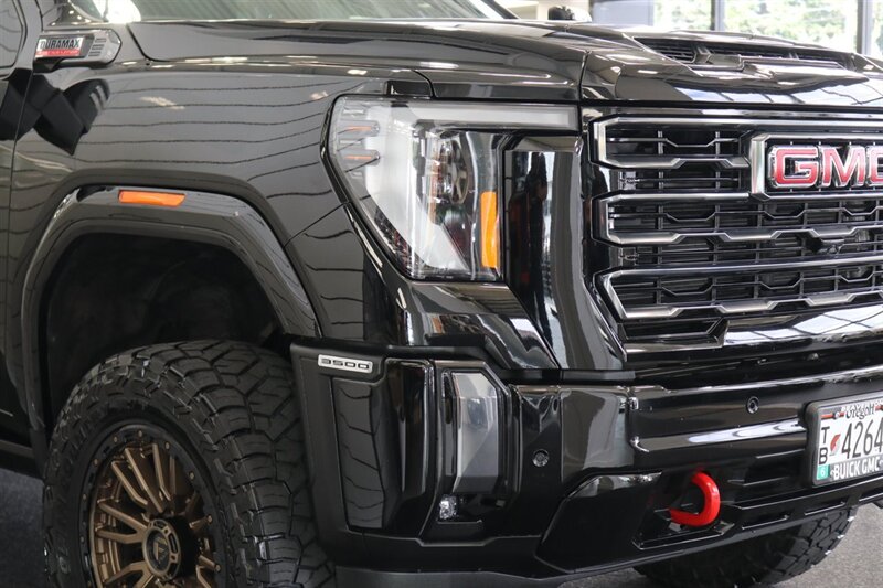 2024 GMC Sierra 3500 AT4  1-OWNER* 4 " COGNITO LIFT W/ FOX SHOCKS* 20 " FUELS 35 " TOYO R/Ts* AT4 PREM PLUS PKG*  PAINT MATCHED FLARES* FULL FRONT PPF* ALL BOOKS & 2-KEYS - Photo 13 - Portland, OR 97230