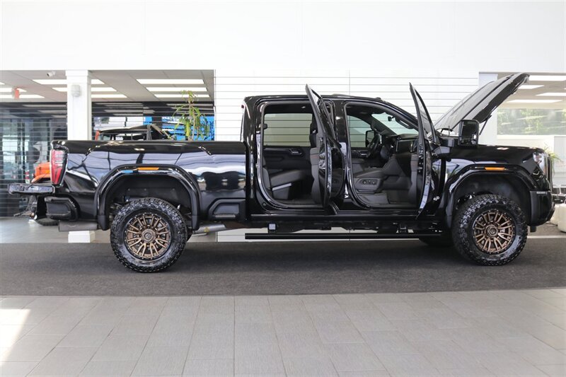 2024 GMC Sierra 3500 AT4  1-OWNER* 4 " COGNITO LIFT W/ FOX SHOCKS* 20 " FUELS 35 " TOYO R/Ts* AT4 PREM PLUS PKG*  PAINT MATCHED FLARES* FULL FRONT PPF* ALL BOOKS & 2-KEYS - Photo 11 - Portland, OR 97230
