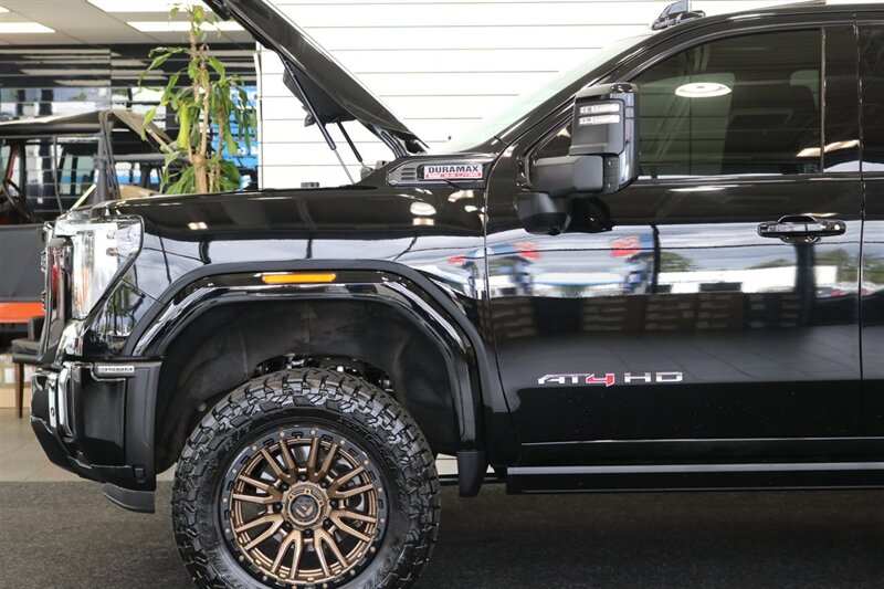 2024 GMC Sierra 3500 AT4  1-OWNER* 4 " COGNITO LIFT W/ FOX SHOCKS* 20 " FUELS 35 " TOYO R/Ts* AT4 PREM PLUS PKG*  PAINT MATCHED FLARES* FULL FRONT PPF* ALL BOOKS & 2-KEYS - Photo 56 - Portland, OR 97230