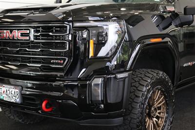 2024 GMC Sierra 3500 AT4  1-OWNER* 4 " COGNITO LIFT W/ FOX SHOCKS* 20 " FUELS 35 " TOYO R/Ts* AT4 PREM PLUS PKG*  PAINT MATCHED FLARES* FULL FRONT PPF* ALL BOOKS & 2-KEYS - Photo 12 - Portland, OR 97230