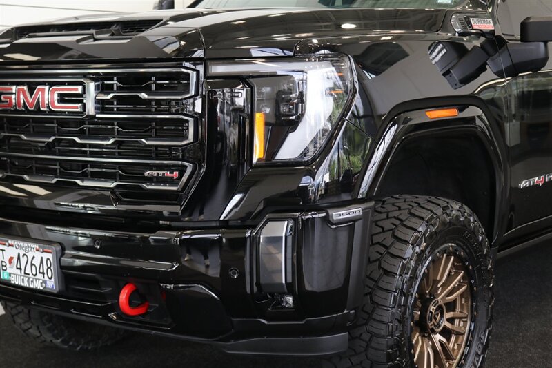2024 GMC Sierra 3500 AT4  1-OWNER* 4 " COGNITO LIFT W/ FOX SHOCKS* 20 " FUELS 35 " TOYO R/Ts* AT4 PREM PLUS PKG*  PAINT MATCHED FLARES* FULL FRONT PPF* ALL BOOKS & 2-KEYS - Photo 12 - Portland, OR 97230