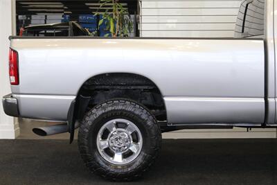 2006 Dodge Ram 3500 100% RUST FREE* 100% STOCK NEVER TUNED* NEW 3 "FABTEC LEVEL KIT W/BILSTEIN 5100s* NEW 35 "TOYO A/T III* NEW BRAKE CALIPERS-ROTORS-PADS-COOLANT FLUSH-BRAKE FLUID FLUSH-BELTS-AC SERVICE* DEALER SERVICED - Photo 45 - Portland, OR 97230