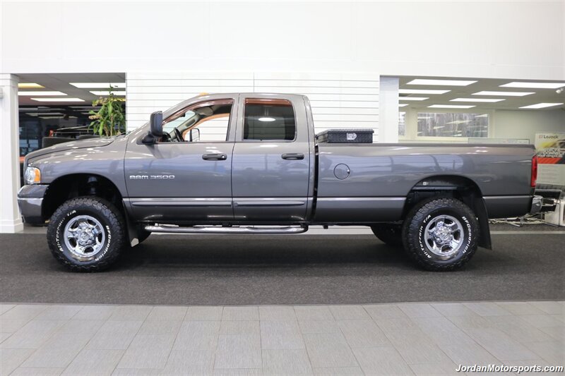 2003 Dodge Ram 3500 Laramie  1-OWNER* 100% RUST FREE* 5.9L LONG BED W/ 6-SPEED MANUAL TRANS* 82K ACTUAL MILES* PACBRAKE EXHAUST BRAKE* BANKS POWER PACKAGE* SPRAY IN BED LINER* REAR AIR BAGS* NEW BILSTEIN 5100 SERIES SHOCKS - Photo 4 - Portland, OR 97230