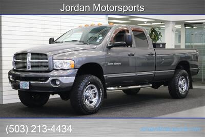 2003 Dodge Ram 3500 Laramie  1-OWNER* 100% RUST FREE* 5.9L LONG BED W/ 6-SPEED MANUAL TRANS* 82K ACTUAL MILES* PACBRAKE EXHAUST BRAKE* BANKS POWER PACKAGE* SPRAY IN BED LINER* REAR AIR BAGS* NEW BILSTEIN 5100 SERIES SHOCKS - Photo 1 - Portland, OR 97230