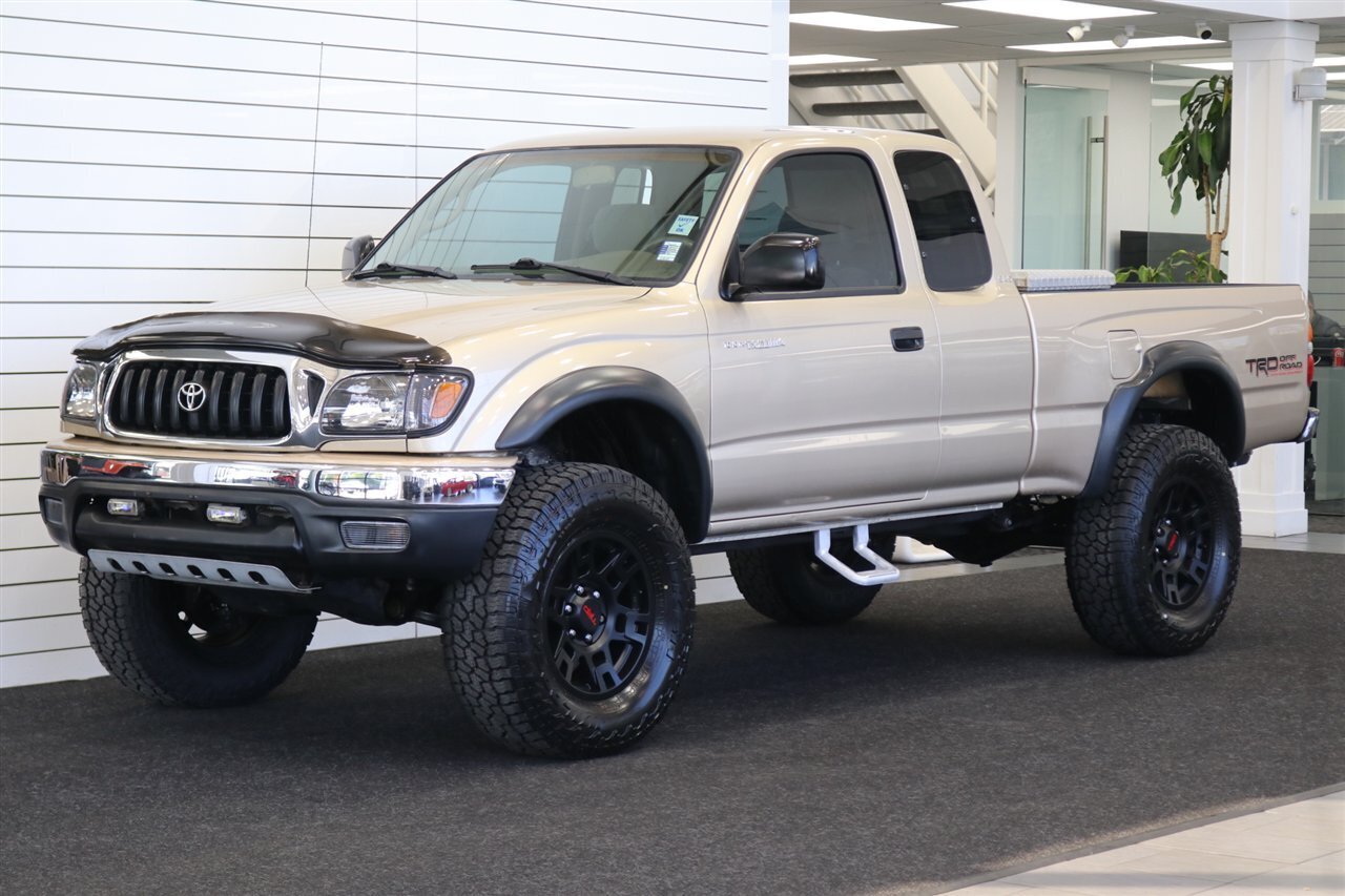 2004 Toyota Tacoma V6  1-OWNER* 100% RUST FREE* NEW 2.5 " BILSTEIN TOYTEC ADJUSTABLE LEVEL LIFT W/ NEW 17 " TRD PROs & 33 " FALKEN A/T4s* TIMING BELT DONE 18K MLS AGO* NEW FLUIDS-AXLES* ALL BOOKS & KEYS & WINDOW STICKER - Photo 1 - Portland, OR 97230