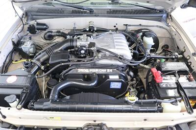 2004 Toyota Tacoma V6  1-OWNER* 100% RUST FREE* NEW 2.5 " BILSTEIN TOYTEC ADJUSTABLE LEVEL LIFT W/ NEW 17 " TRD PROs & 33 " FALKEN A/T4s* TIMING BELT DONE 18K MLS AGO* NEW FLUIDS-AXLES* ALL BOOKS & KEYS & WINDOW STICKER - Photo 14 - Portland, OR 97230