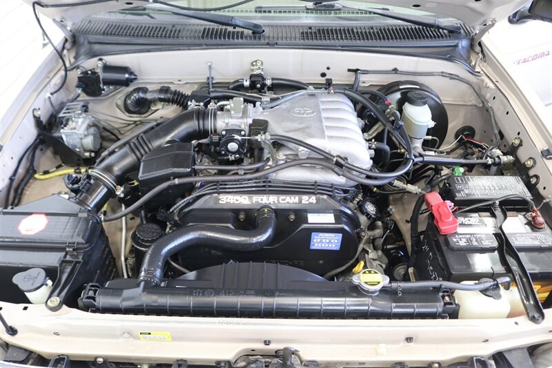 2004 Toyota Tacoma V6  1-OWNER* 100% RUST FREE* NEW 2.5 " BILSTEIN TOYTEC ADJUSTABLE LEVEL LIFT W/ NEW 17 " TRD PROs & 33 " FALKEN A/T4s* TIMING BELT DONE 18K MLS AGO* NEW FLUIDS-AXLES* ALL BOOKS & KEYS & WINDOW STICKER - Photo 14 - Portland, OR 97230