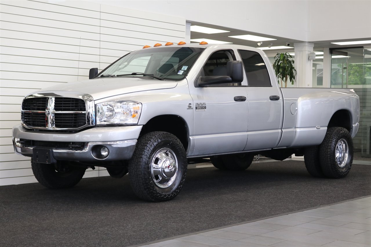 2007 Dodge Ram 3500 SLT  1-OWNER* 5.9L HO* 6-SPEED MANUAL* CUMMINS EXHAUST BRAKE* 100% RUST FREE* NEW 6 FALKEN A/T 4W 10-PLYS* NEW BRAKES-ROTORS-CALIPERS-COOLANT & BRAKE FLUID FLUSH* LINEX BED LINER* ALL BOOKS & KEYS - Photo 1 - Portland, OR 97230
