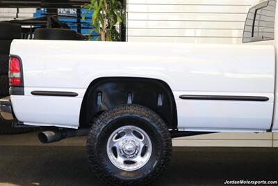 2001 Dodge Ram 2500 SLT  1-OWNER* SINGLE CAB* 5.9L CUMMINS* 6-SPEED MANUAL* 100% RUST & CORROSION FREE* LIKE NEW BED* BD EXHAUST BRAKE* AIR DOG INJECTION PUMP* MBRB FULL EXHAUST* ZERO PAINT* COLLECTOR QUALITY - Photo 61 - Portland, OR 97230