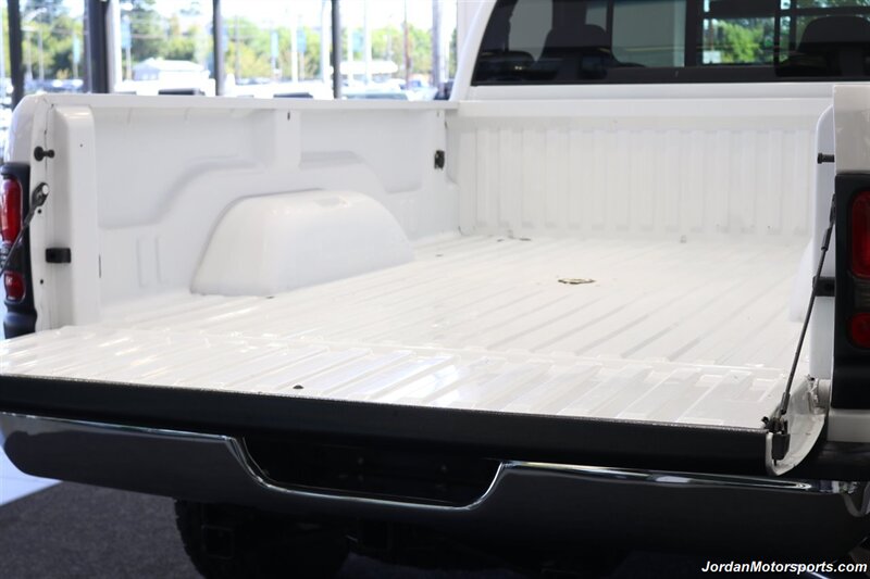 2001 Dodge Ram 2500 SLT  1-OWNER* SINGLE CAB* 5.9L CUMMINS* 6-SPEED MANUAL* 100% RUST & CORROSION FREE* LIKE NEW BED* BD EXHAUST BRAKE* AIR DOG INJECTION PUMP* MBRB FULL EXHAUST* ZERO PAINT* COLLECTOR QUALITY - Photo 51 - Portland, OR 97230