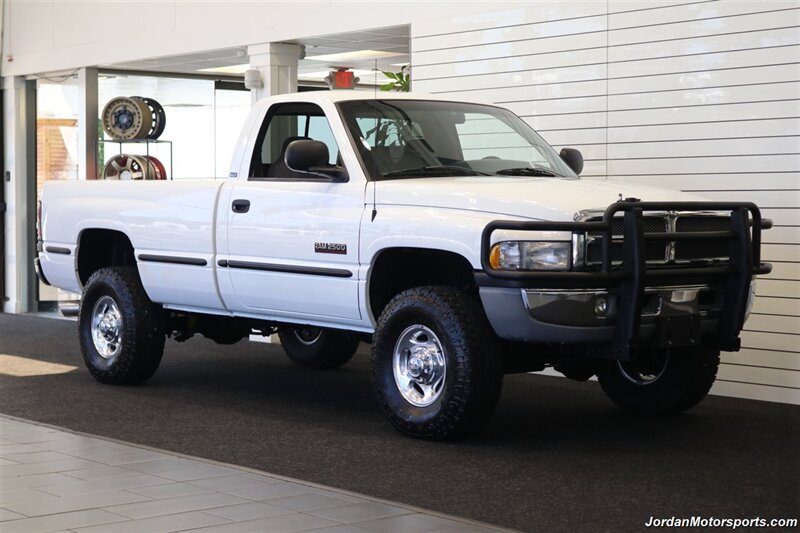 2001 Dodge Ram 2500 SLT  1-OWNER* SINGLE CAB* 5.9L CUMMINS* 6-SPEED MANUAL* 100% RUST & CORROSION FREE* LIKE NEW BED* BD EXHAUST BRAKE* AIR DOG INJECTION PUMP* MBRB FULL EXHAUST* ZERO PAINT* COLLECTOR QUALITY - Photo 2 - Portland, OR 97230