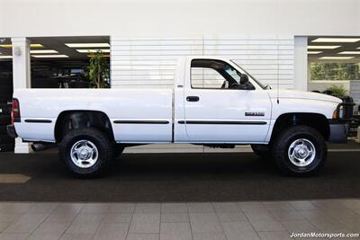2001 Dodge Ram 2500 SLT  1-OWNER* SINGLE CAB* 5.9L CUMMINS* 6-SPEED MANUAL* 100% RUST & CORROSION FREE* LIKE NEW BED* BD EXHAUST BRAKE* AIR DOG INJECTION PUMP* MBRB FULL EXHAUST* ZERO PAINT* COLLECTOR QUALITY - Photo 5 - Portland, OR 97230