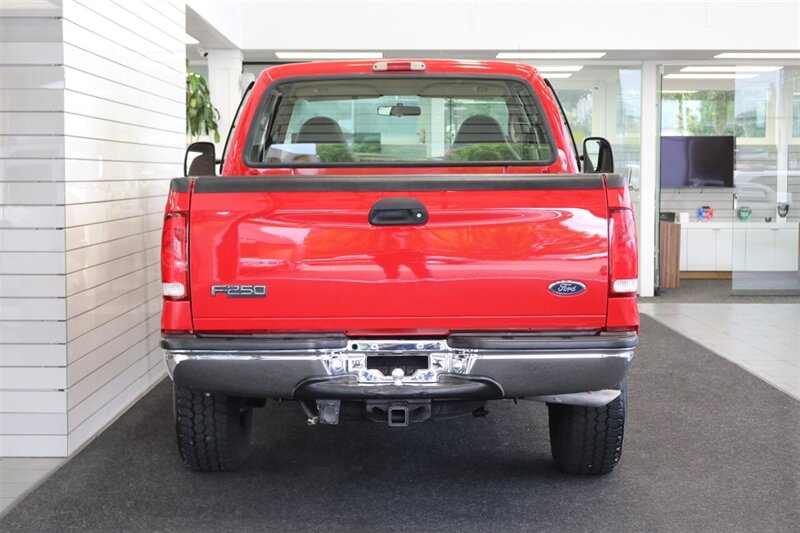 1999 Ford F-250 xlt 1-OWNER* 100% RUST FREE* TRITON V-10* 5-SPEED MANUAL* LINEX BED LINER* REAR AIR BAGS* NEW BRAKES-ROTORS-CALIPERS-BALL JOINTS-BRAKE FLUID & COOLANT FLUSH* ALL BOOKS-KEYS-WINDOW STICKER* SHORT BED - Photo 9 - Portland, OR 97230