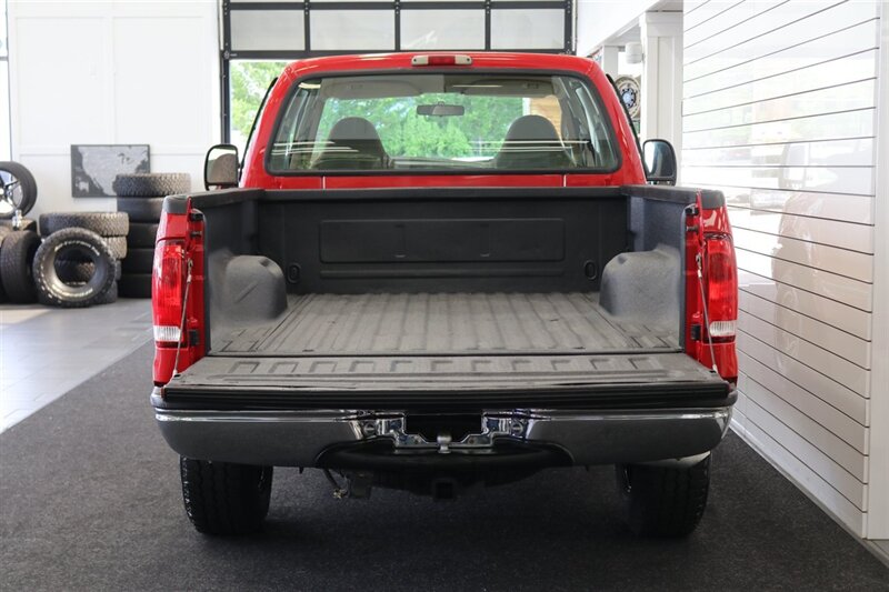 1999 Ford F-250 xlt 1-OWNER* 100% RUST FREE* TRITON V-10* 5-SPEED MANUAL* LINEX BED LINER* REAR AIR BAGS* NEW BRAKES-ROTORS-CALIPERS-BALL JOINTS-BRAKE FLUID & COOLANT FLUSH* ALL BOOKS-KEYS-WINDOW STICKER* SHORT BED - Photo 15 - Portland, OR 97230