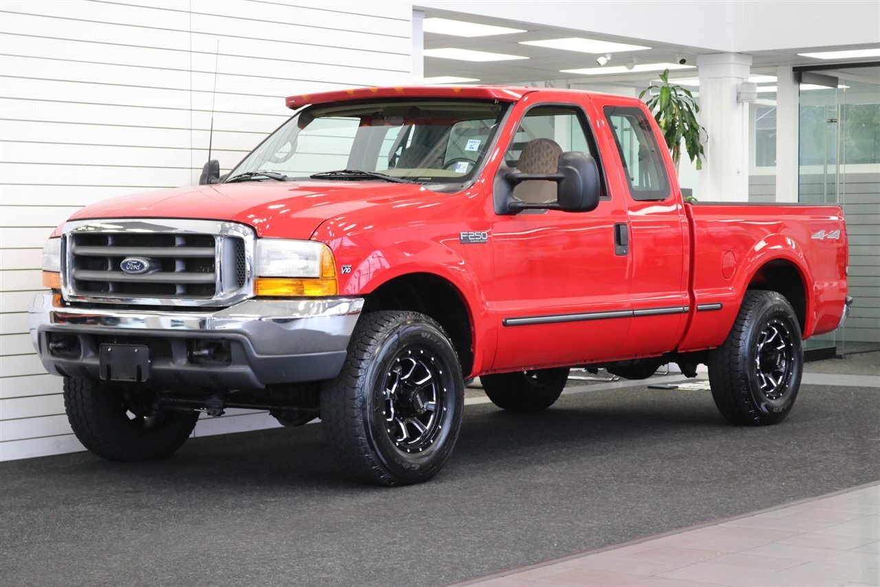 1999 Ford F-250 xlt  1-OWNER* 100% RUST FREE* TRITON V-10* 5-SPEED MANUAL* LINEX BED LINER* REAR AIR BAGS* NEW BRAKES-ROTORS-CALIPERS-BALL JOINTS-BRAKE FLUID & COOLANT FLUSH* ALL BOOKS-KEYS-WINDOW STICKER* SHORT BED - Photo 1 - Portland, OR 97230