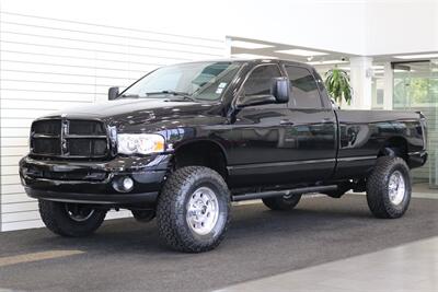 2004 Dodge Ram 2500 Laramie  100% RUST FREE* NEW 3 " FABTEC LEVEL LIFT W/ BILSTEIN 5100 SHOCKS* TRANSFER TANK* REAR AIR BAGS* NEW 17 "WHEELS W/ NEW 35 " TOYO'S 10-PLYS* LARAMIE LONG BED* NEW BRAKES-ROTORS-CALIPERS-FLUIDS - Photo 1 - Portland, OR 97230