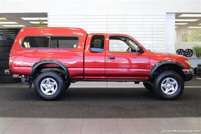 2003 Toyota Tacoma V6  1-OWNER* 87K MLS* 100% RUST & CORROSION FREE* TIMING BELT-WATER PUMP-FLUIDS SERVICED* NEW 2.5 " BILSTEIN LEVEL KIT W/DIFF DROPS* REAR LOCKERS* SR5 W/5-SPEED MANUAL* ALL BOOKS & KEYS & WINDOW STICKER - Photo 5 - Portland, OR 97230