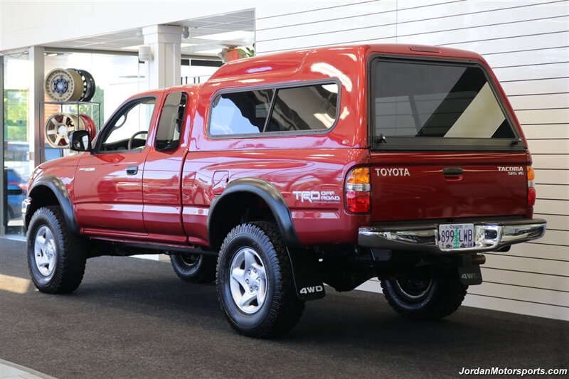 2003 Toyota Tacoma V6  1-OWNER* 87K MLS* 100% RUST & CORROSION FREE* TIMING BELT-WATER PUMP-FLUIDS SERVICED* NEW 2.5 " BILSTEIN LEVEL KIT W/DIFF DROPS* REAR LOCKERS* SR5 W/5-SPEED MANUAL* ALL BOOKS & KEYS & WINDOW STICKER - Photo 6 - Portland, OR 97230