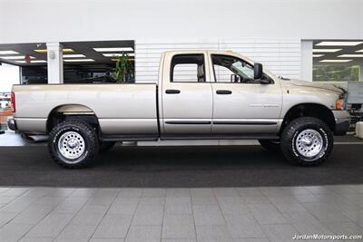2005 Dodge Ram 3500 SLT 4dr Quad Cab  1-OWNER 100% RUST & CORROSION FREE* 5.9L HIGH OUTPUT CUMMINS* NEVER HAD 5TH WHEEL OR GOOSENECK* NEW 3 "BILSTEIN 5100 LEVEL LIFT W/NEW 35 " BFG KO3 10-PLYs* LEATHER LONG BED - Photo 5 - Portland, OR 97230