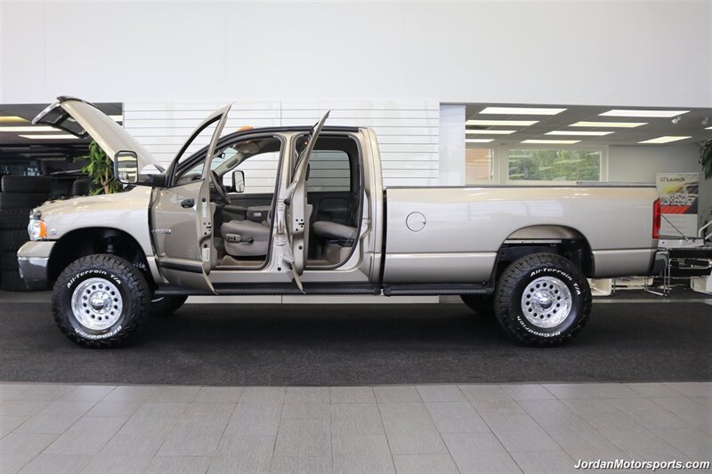 2005 Dodge Ram 3500 SLT 4dr Quad Cab  1-OWNER 100% RUST & CORROSION FREE* 5.9L HIGH OUTPUT CUMMINS* NEVER HAD 5TH WHEEL OR GOOSENECK* NEW 3 "BILSTEIN 5100 LEVEL LIFT W/NEW 35 " BFG KO3 10-PLYs* LEATHER LONG BED - Photo 10 - Portland, OR 97230