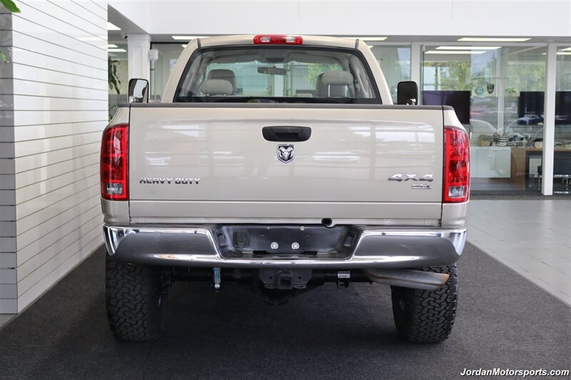 2005 Dodge Ram 3500 SLT 4dr Quad Cab  1-OWNER 100% RUST & CORROSION FREE* 5.9L HIGH OUTPUT CUMMINS* NEVER HAD 5TH WHEEL OR GOOSENECK* NEW 3 "BILSTEIN 5100 LEVEL LIFT W/NEW 35 " BFG KO3 10-PLYs* LEATHER LONG BED - Photo 9 - Portland, OR 97230