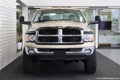 2005 Dodge Ram 3500 SLT 4dr Quad Cab  1-OWNER 100% RUST & CORROSION FREE* 5.9L HIGH OUTPUT CUMMINS* NEVER HAD 5TH WHEEL OR GOOSENECK* NEW 3 "BILSTEIN 5100 LEVEL LIFT W/NEW 35 " BFG KO3 10-PLYs* LEATHER LONG BED - Photo 8 - Portland, OR 97230