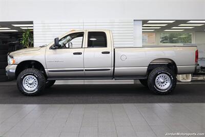2005 Dodge Ram 3500 SLT 4dr Quad Cab  1-OWNER 100% RUST & CORROSION FREE* 5.9L HIGH OUTPUT CUMMINS* NEVER HAD 5TH WHEEL OR GOOSENECK* NEW 3 "BILSTEIN 5100 LEVEL LIFT W/NEW 35 " BFG KO3 10-PLYs* LEATHER LONG BED - Photo 4 - Portland, OR 97230