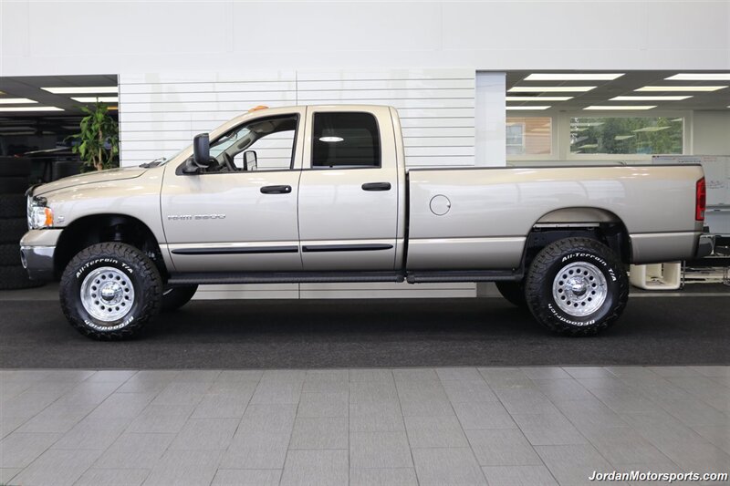 2005 Dodge Ram 3500 SLT 4dr Quad Cab  1-OWNER 100% RUST & CORROSION FREE* 5.9L HIGH OUTPUT CUMMINS* NEVER HAD 5TH WHEEL OR GOOSENECK* NEW 3 "BILSTEIN 5100 LEVEL LIFT W/NEW 35 " BFG KO3 10-PLYs* LEATHER LONG BED - Photo 4 - Portland, OR 97230