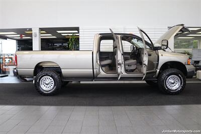 2005 Dodge Ram 3500 SLT 4dr Quad Cab  1-OWNER 100% RUST & CORROSION FREE* 5.9L HIGH OUTPUT CUMMINS* NEVER HAD 5TH WHEEL OR GOOSENECK* NEW 3 "BILSTEIN 5100 LEVEL LIFT W/NEW 35 " BFG KO3 10-PLYs* LEATHER LONG BED - Photo 16 - Portland, OR 97230