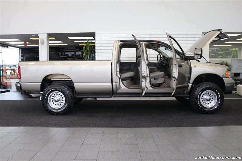 2005 Dodge Ram 3500 SLT 4dr Quad Cab  1-OWNER 100% RUST & CORROSION FREE* 5.9L HIGH OUTPUT CUMMINS* NEVER HAD 5TH WHEEL OR GOOSENECK* NEW 3 "BILSTEIN 5100 LEVEL LIFT W/NEW 35 " BFG KO3 10-PLYs* LEATHER LONG BED - Photo 16 - Portland, OR 97230