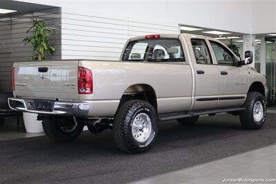 2005 Dodge Ram 3500 SLT 4dr Quad Cab  1-OWNER 100% RUST & CORROSION FREE* 5.9L HIGH OUTPUT CUMMINS* NEVER HAD 5TH WHEEL OR GOOSENECK* NEW 3 "BILSTEIN 5100 LEVEL LIFT W/NEW 35 " BFG KO3 10-PLYs* LEATHER LONG BED - Photo 7 - Portland, OR 97230