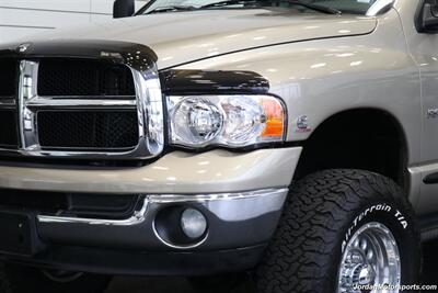 2005 Dodge Ram 3500 SLT 4dr Quad Cab  1-OWNER 100% RUST & CORROSION FREE* 5.9L HIGH OUTPUT CUMMINS* NEVER HAD 5TH WHEEL OR GOOSENECK* NEW 3 "BILSTEIN 5100 LEVEL LIFT W/NEW 35 " BFG KO3 10-PLYs* LEATHER LONG BED - Photo 17 - Portland, OR 97230