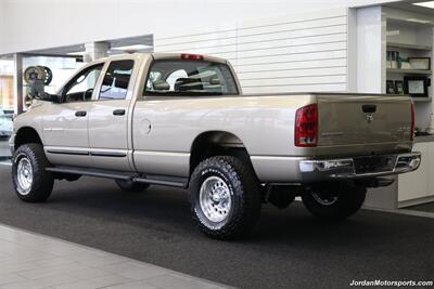 2005 Dodge Ram 3500 SLT 4dr Quad Cab  1-OWNER 100% RUST & CORROSION FREE* 5.9L HIGH OUTPUT CUMMINS* NEVER HAD 5TH WHEEL OR GOOSENECK* NEW 3 "BILSTEIN 5100 LEVEL LIFT W/NEW 35 " BFG KO3 10-PLYs* LEATHER LONG BED - Photo 6 - Portland, OR 97230