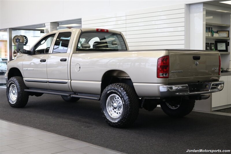 2005 Dodge Ram 3500 SLT 4dr Quad Cab  1-OWNER 100% RUST & CORROSION FREE* 5.9L HIGH OUTPUT CUMMINS* NEVER HAD 5TH WHEEL OR GOOSENECK* NEW 3 "BILSTEIN 5100 LEVEL LIFT W/NEW 35 " BFG KO3 10-PLYs* LEATHER LONG BED - Photo 6 - Portland, OR 97230